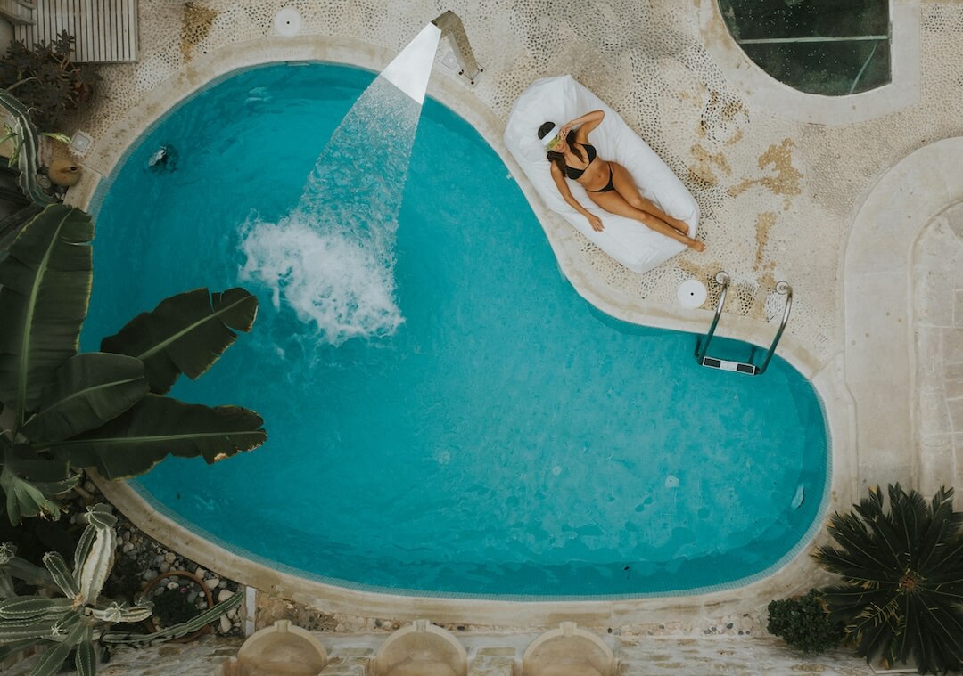Florida Climate and Pool Sanitation: Why Timing Matters Image